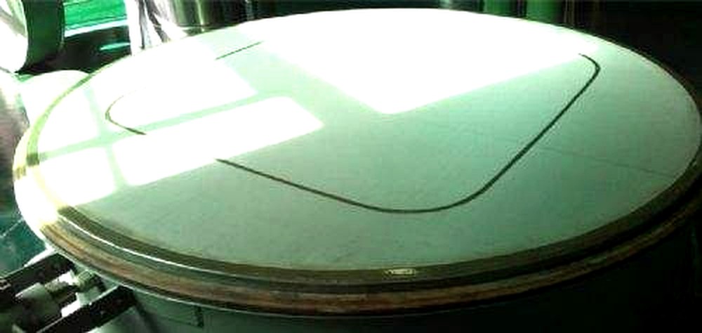 Near-size particles blocking vibrating sieve mesh openings