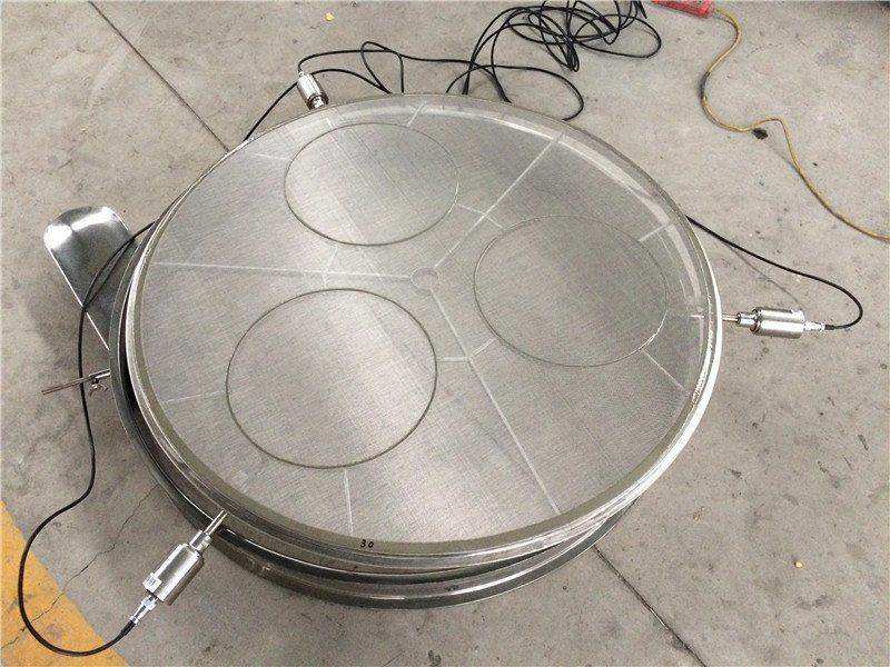Ultrasonic resonance ring with transducers for vibrating sieve mesh deblinding